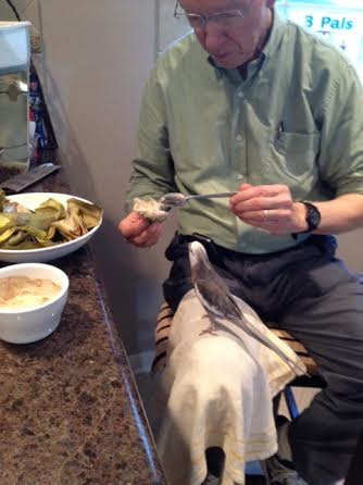 Grandpa keeps dipping that delicious-looking green thing in it.