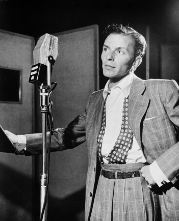 Frank Sinatra, singing suave manly songs into the microphone (image courtesy of Wikipedia).