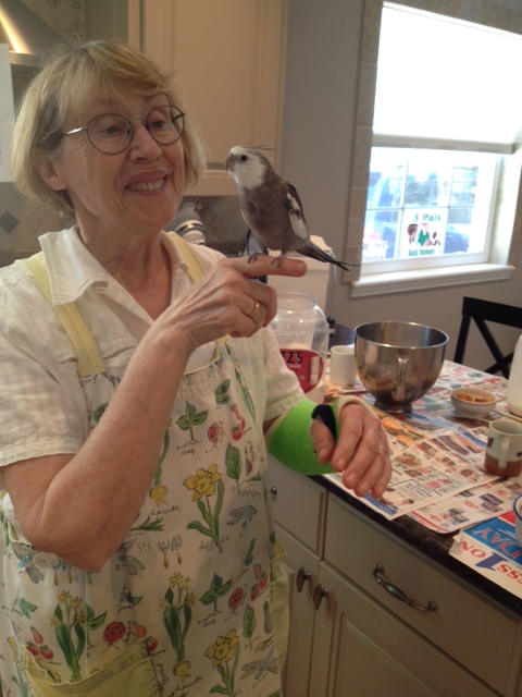 Grandma is smiling (as she always does when she admires me) but I can see that green thing on her arm.