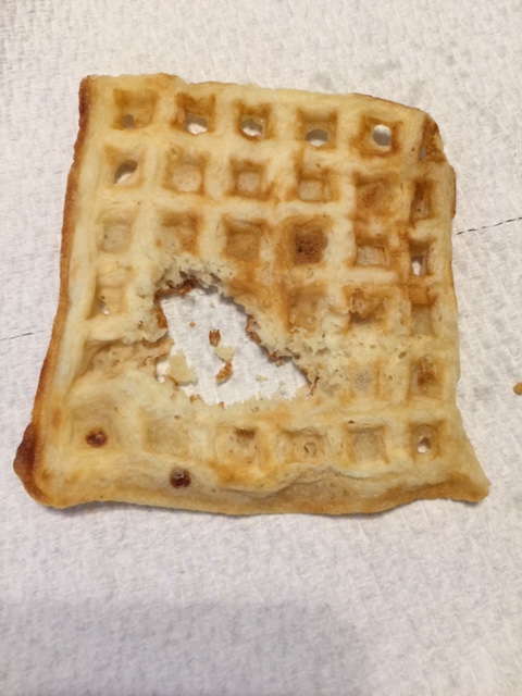 A waffle with a heart-shaped (head-sized) hole in it!